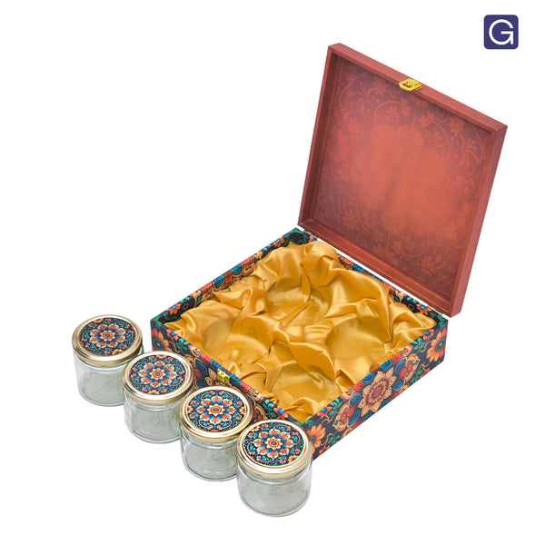 Open red floral foil wooden gift hamper box showing 4 jars