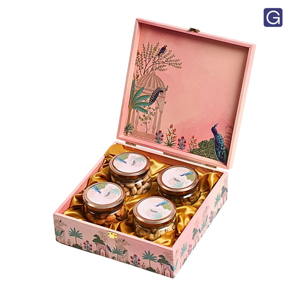 Open pink wooden gift box showing 4 jars arrangement