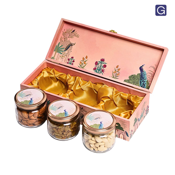 Pink Peacock hamper box open showing 3 glass jars