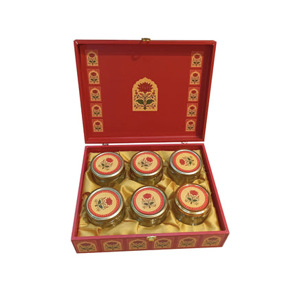 6 glass jars arranged in royal door wooden box